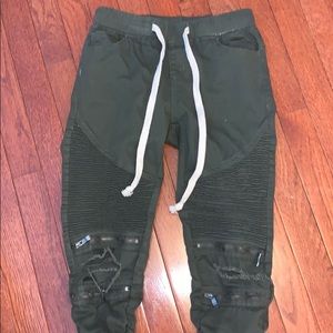 Green motorcycle jeans with sinch at bottom